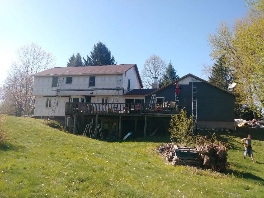 Slide of Uptop Roofing