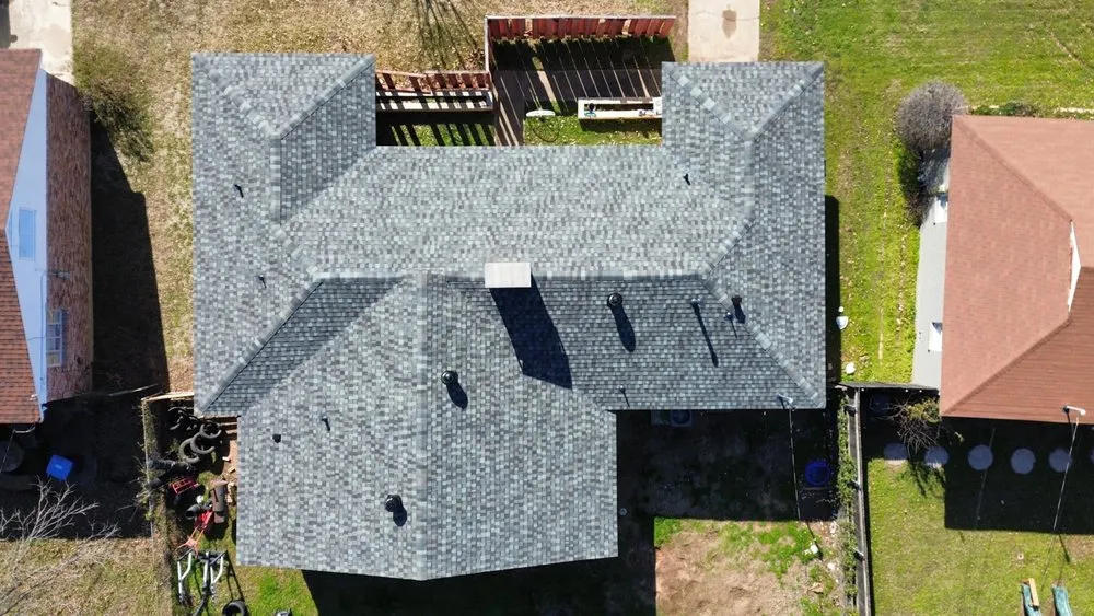 Slide of Uptown Roofing & Co