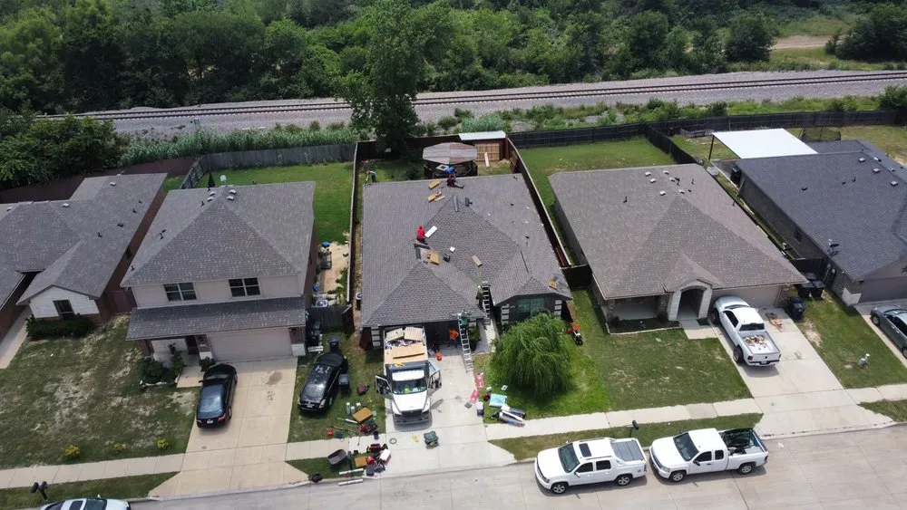 Slide of Uptown Roofing & Co