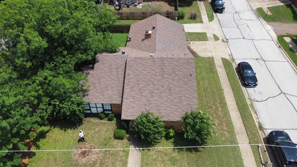 Slide of Uptown Roofing & Co