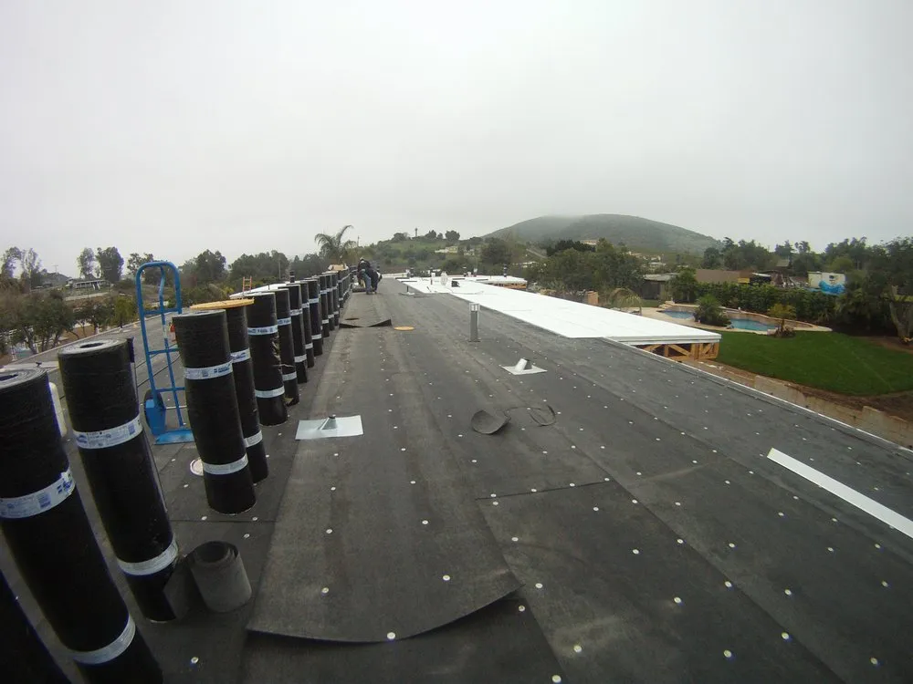 Slide of Urbach Roofing