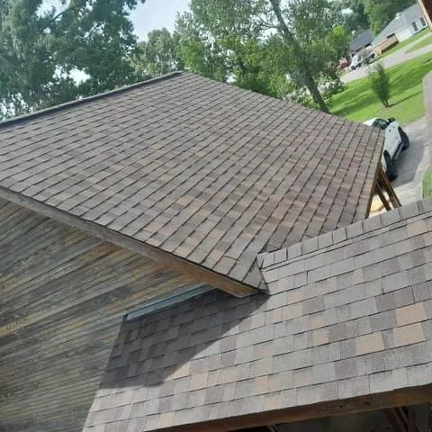 Slide of Urbina Roofing