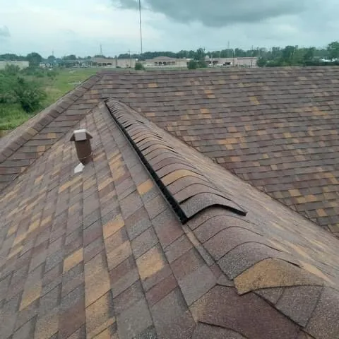 Slide of Urbina Roofing