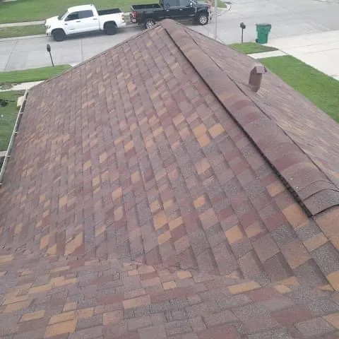 Slide of Urbina Roofing