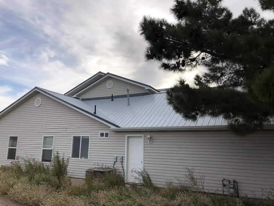 Slide of Uribe Roofing