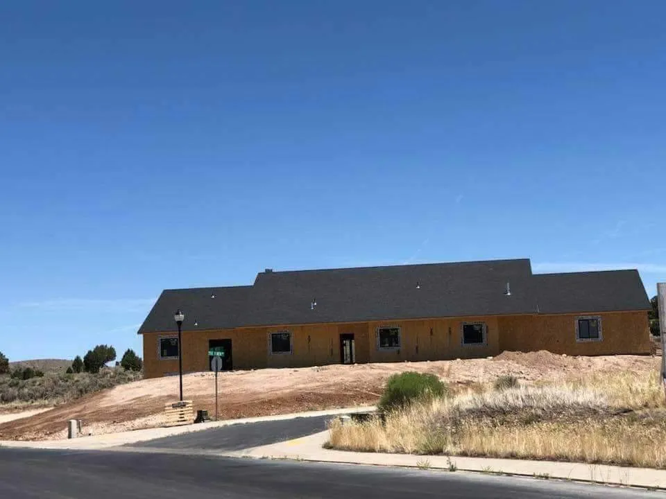 Slide of Uribe Roofing