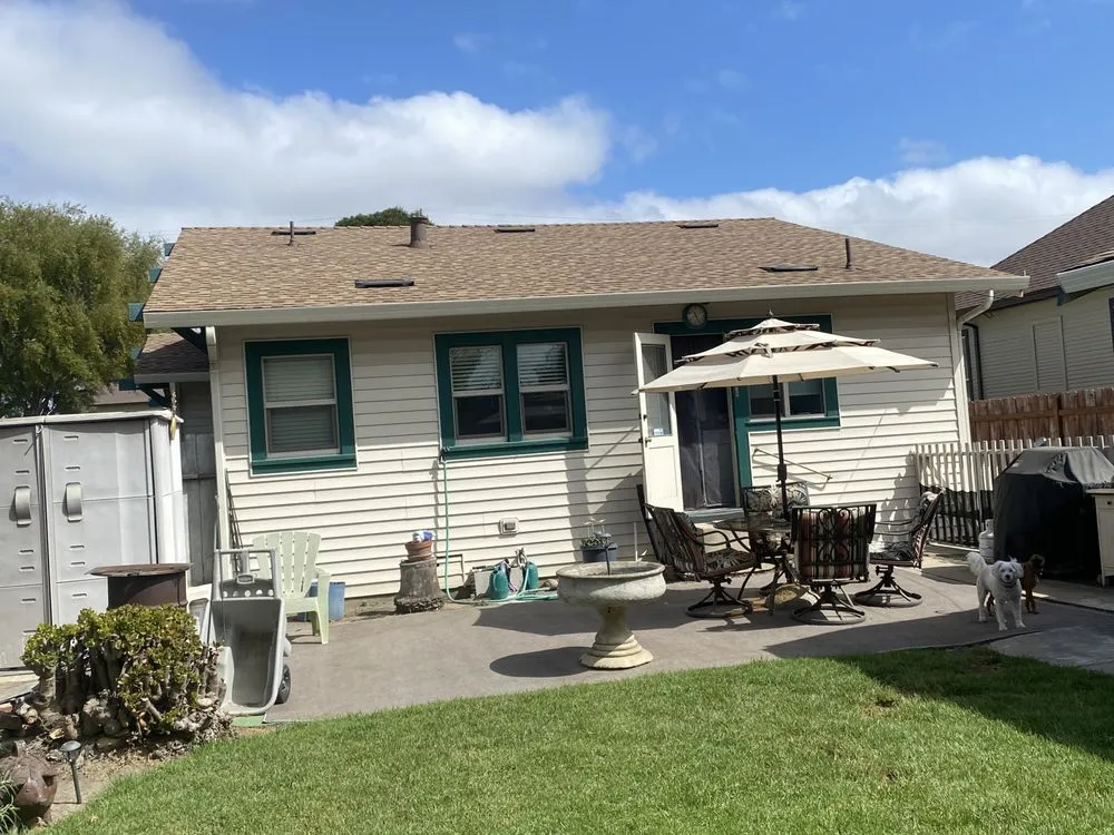 Slide of Urrutia Roofing