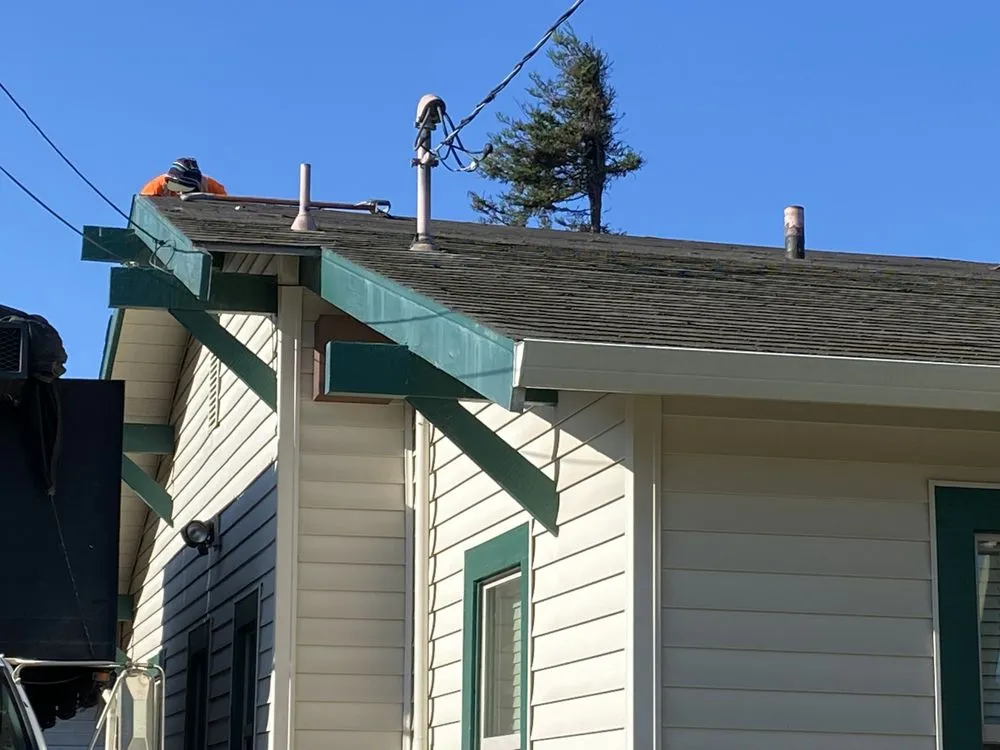 Slide of Urrutia Roofing