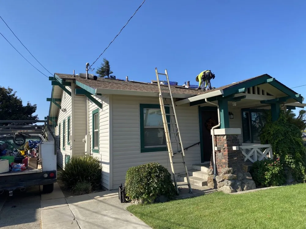 Slide of Urrutia Roofing