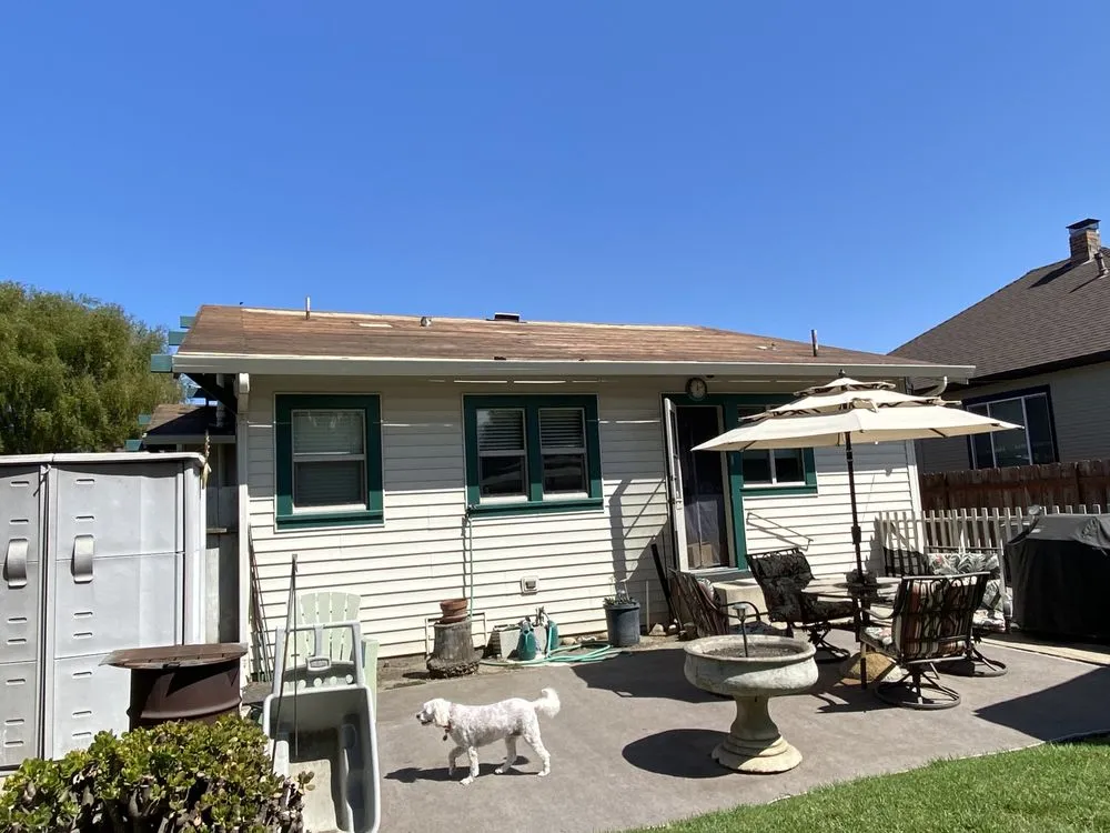 Slide of Urrutia Roofing