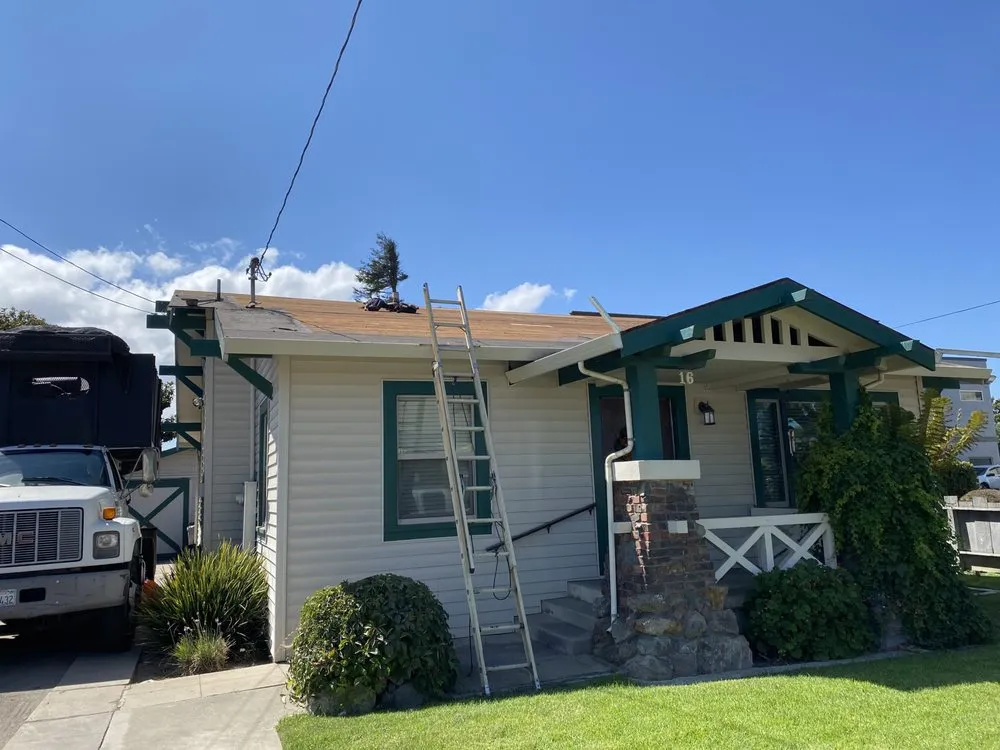 Slide of Urrutia Roofing