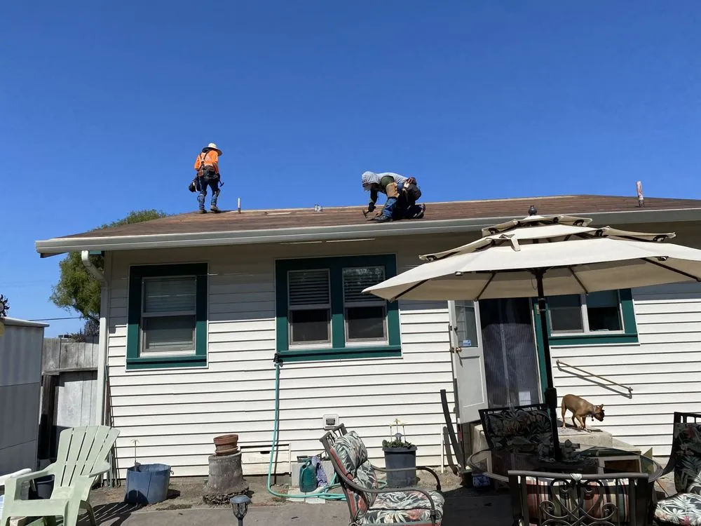 Slide of Urrutia Roofing