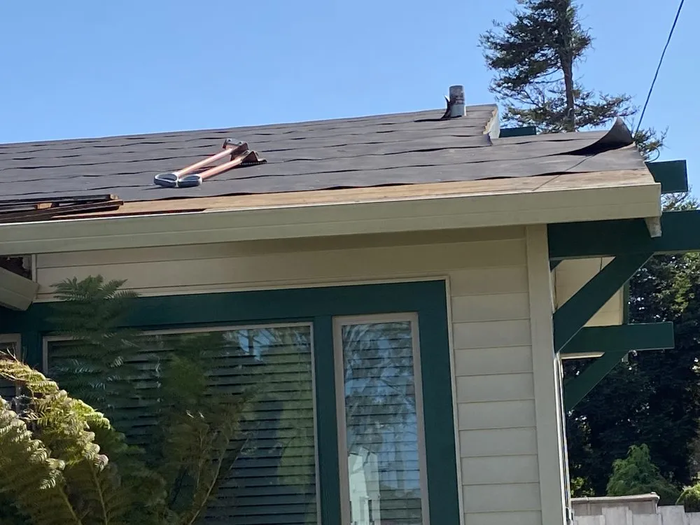 Slide of Urrutia Roofing