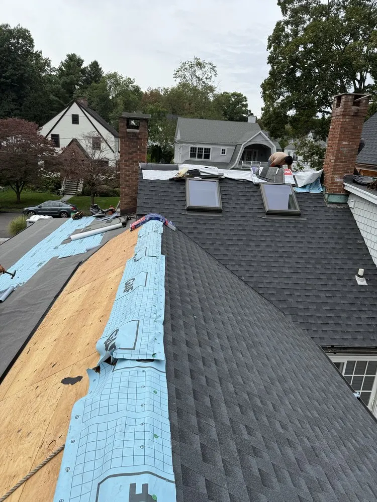 Slide of Us Juarez Roofing