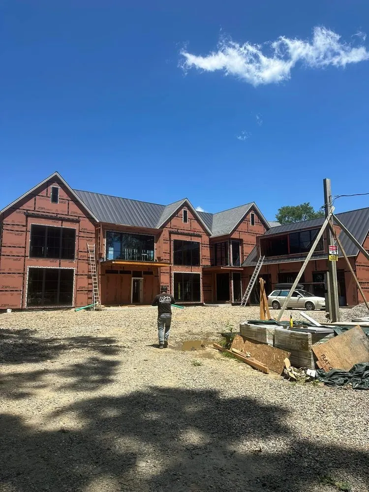 Slide of Us Juarez Roofing