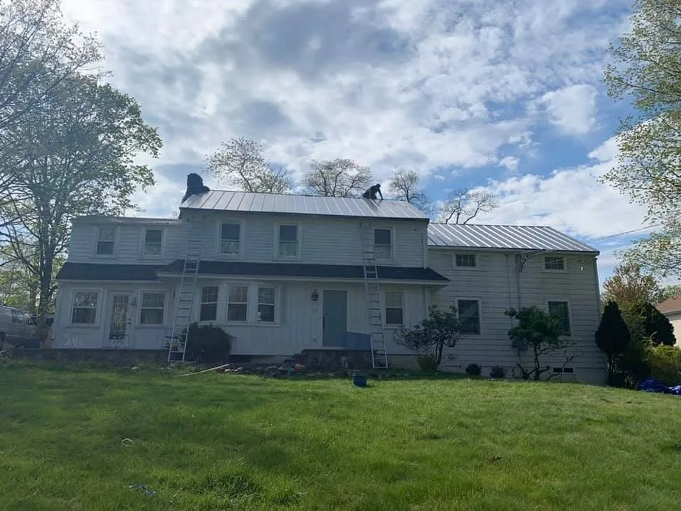 Slide of Us Juarez Roofing