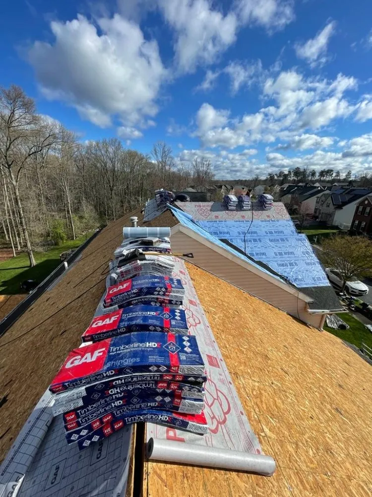 Slide of Us Roofing Restoration
