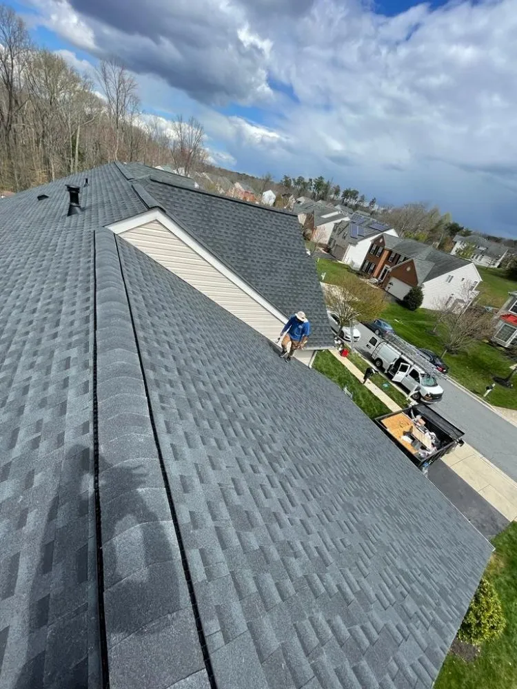 Slide of Us Roofing Restoration