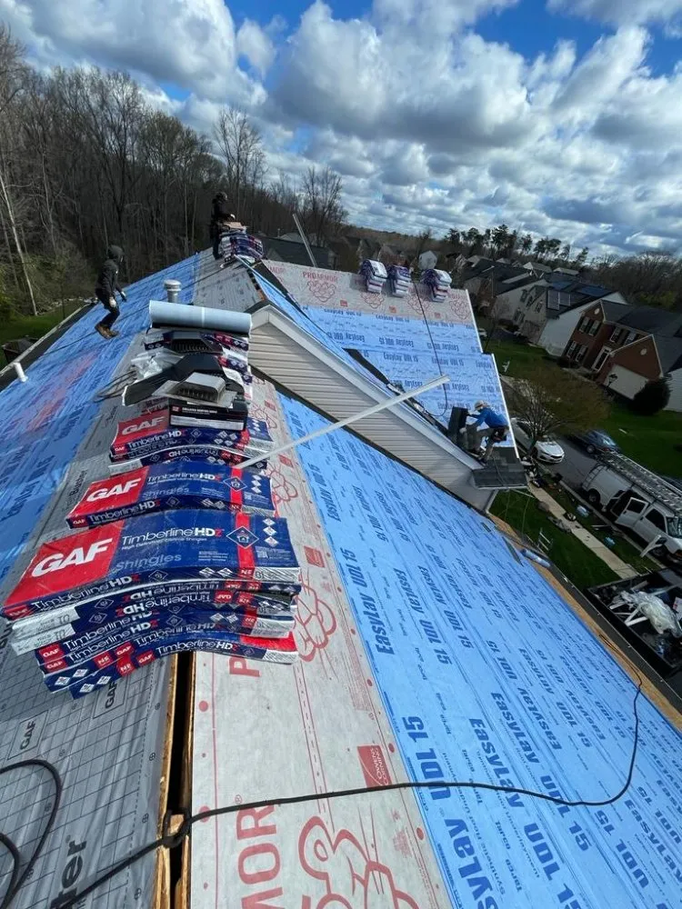 Slide of Us Roofing Restoration