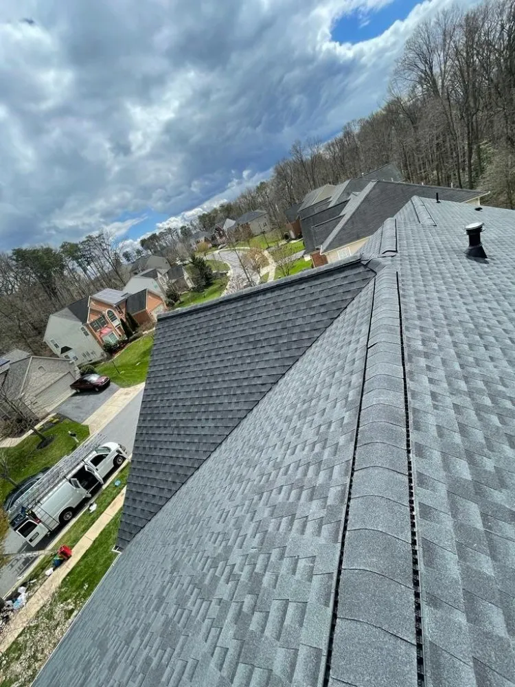 Slide of Us Roofing Restoration