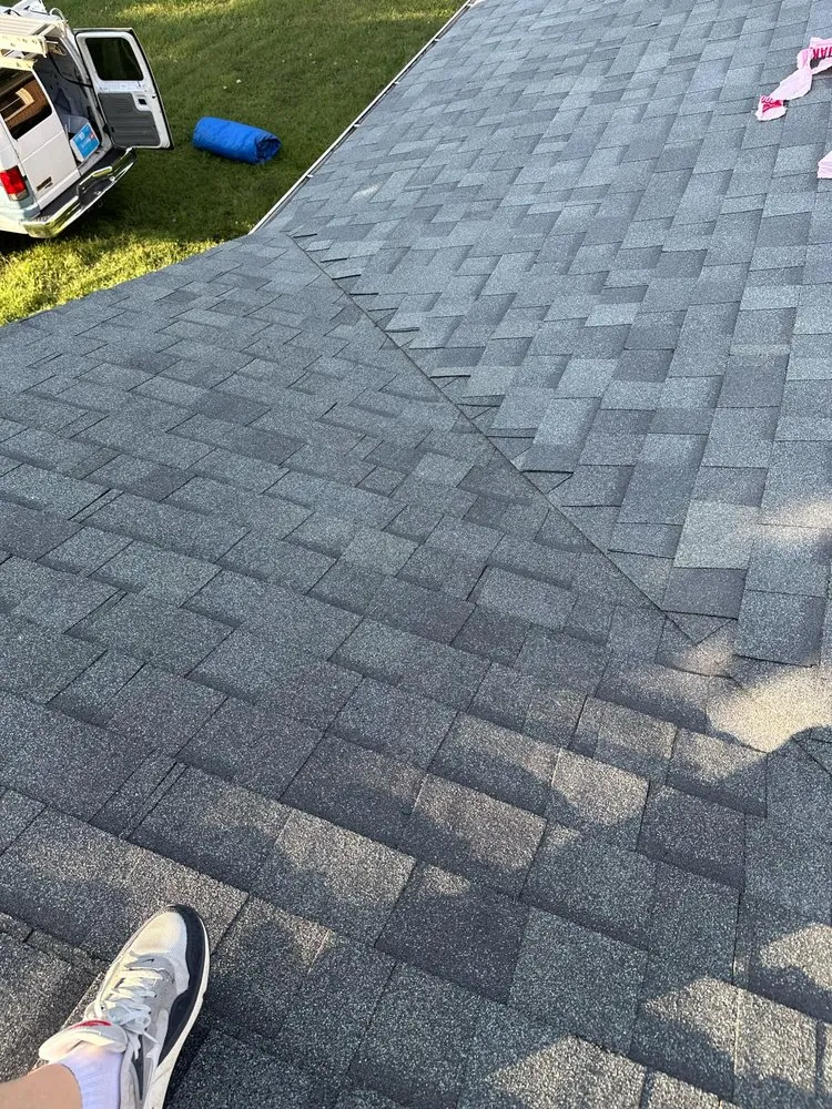 Slide of USA Roofing and Repairs