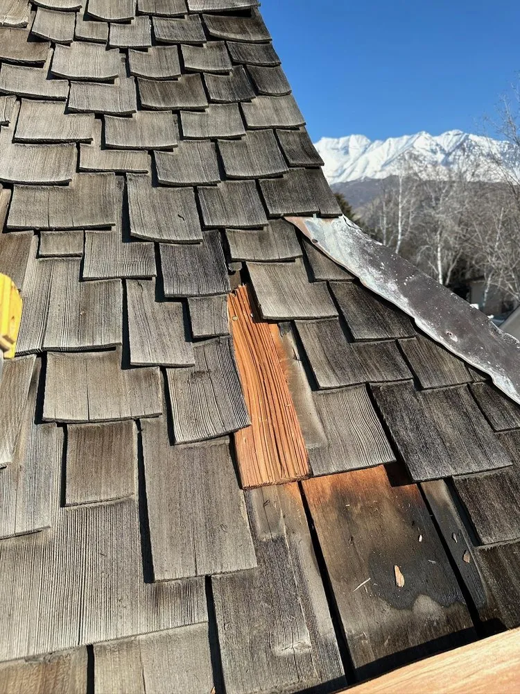 Slide of Utah Roofing Experts