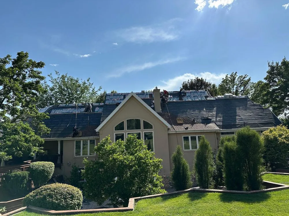 Slide of Utah Roofing Experts