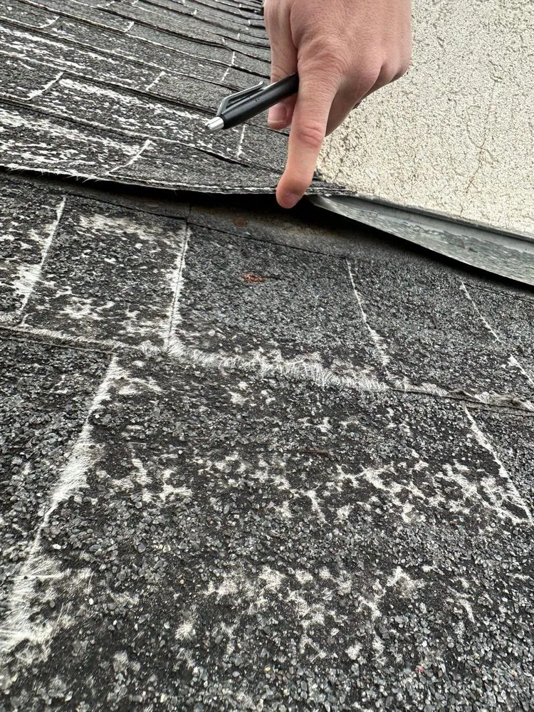 Slide of Utah Roofing Experts