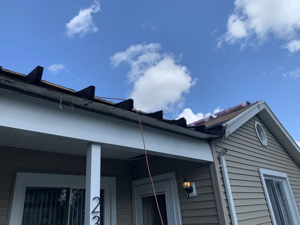 Slide of Utica Roof Pros