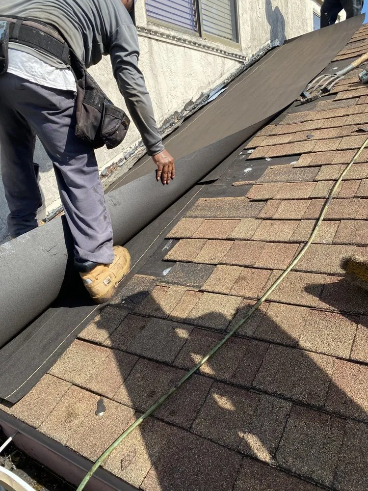 Slide of V & A Roofing