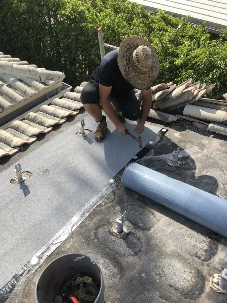 Slide of V & A Roofing