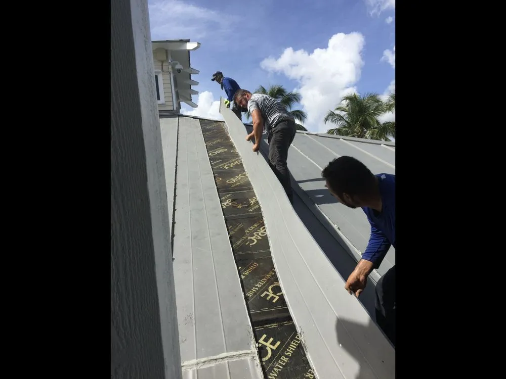Slide of V & A Roofing