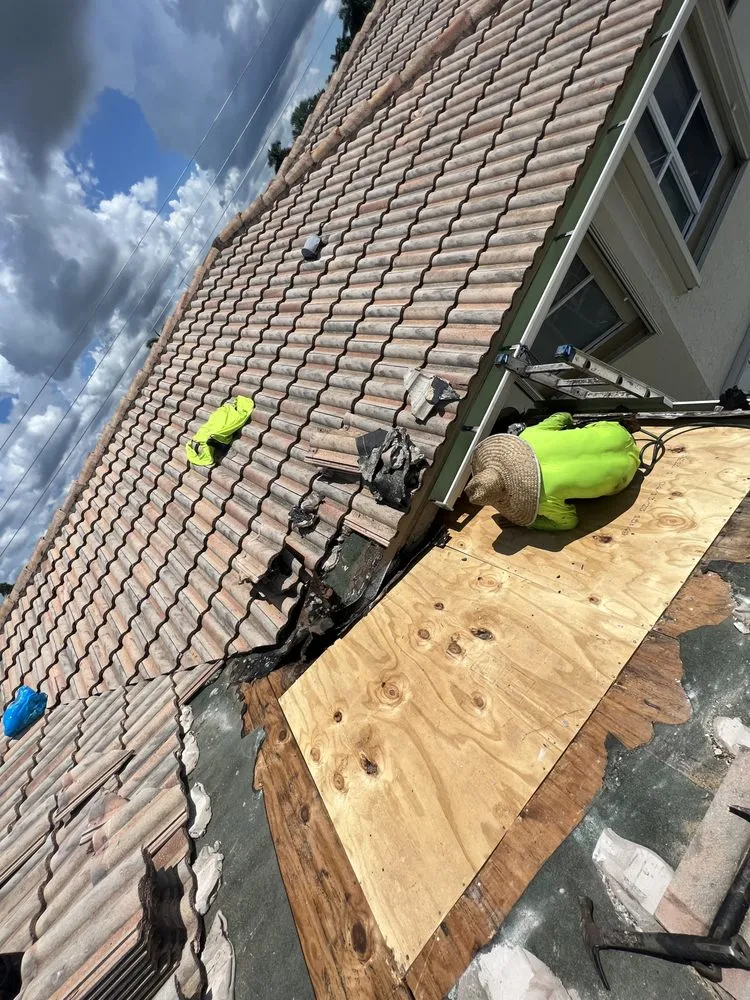 Slide of V & A Roofing