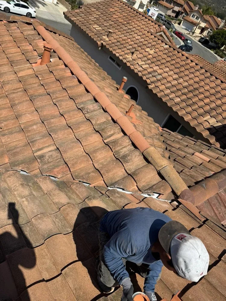 Slide of V J Roofing