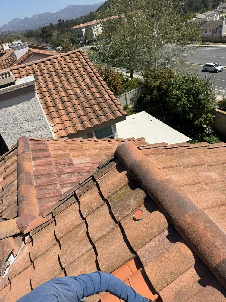 Slide of V J Roofing