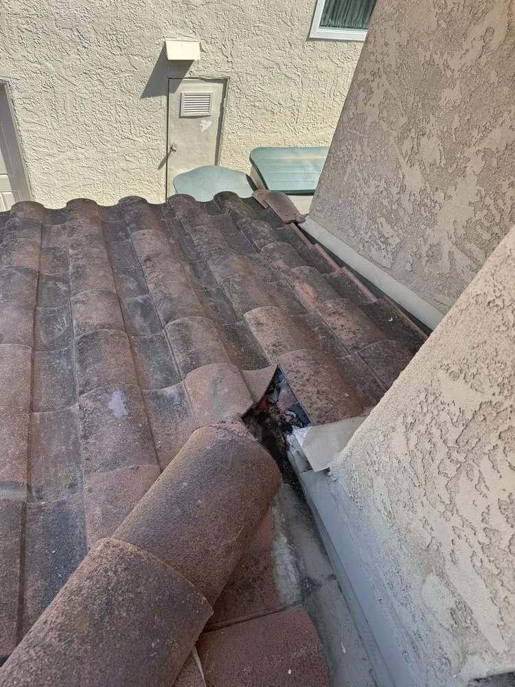 Slide of V J Roofing