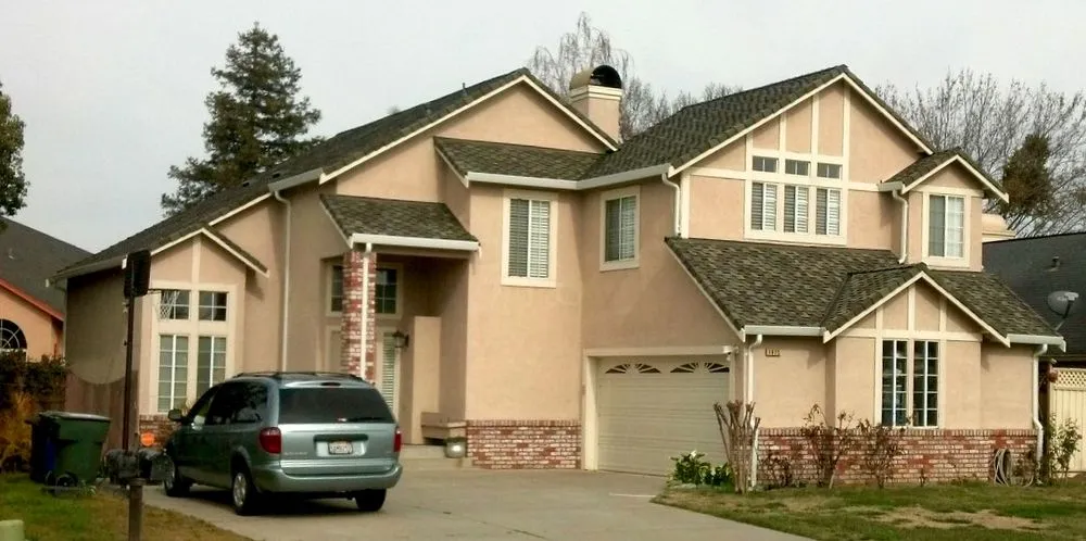 Slide of V Mendoza Roofing