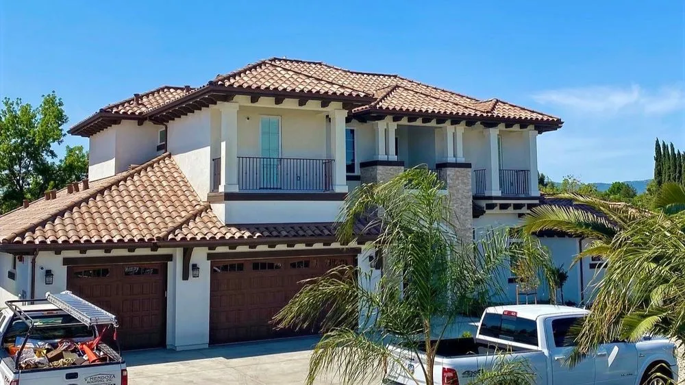 Slide of V Mendoza Roofing