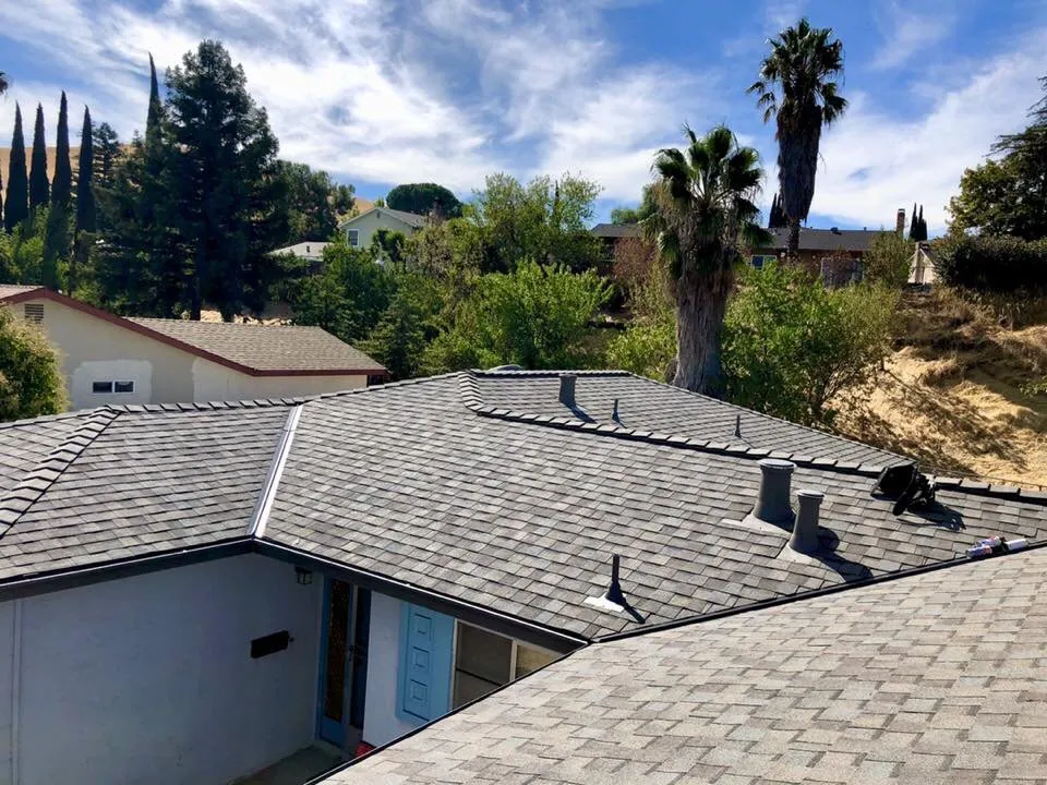 Slide of V Mendoza Roofing