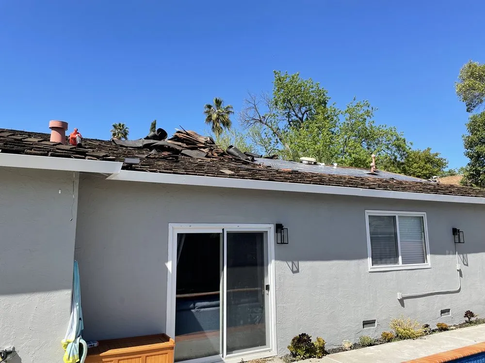 Slide of V Mendoza Roofing