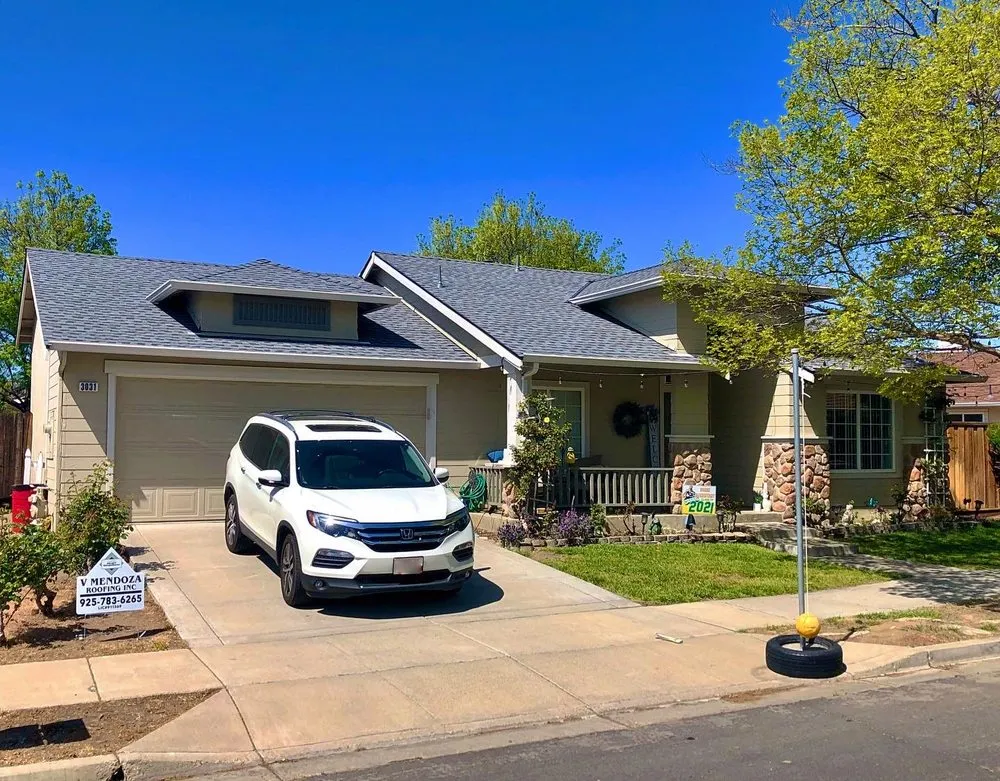 Slide of V Mendoza Roofing