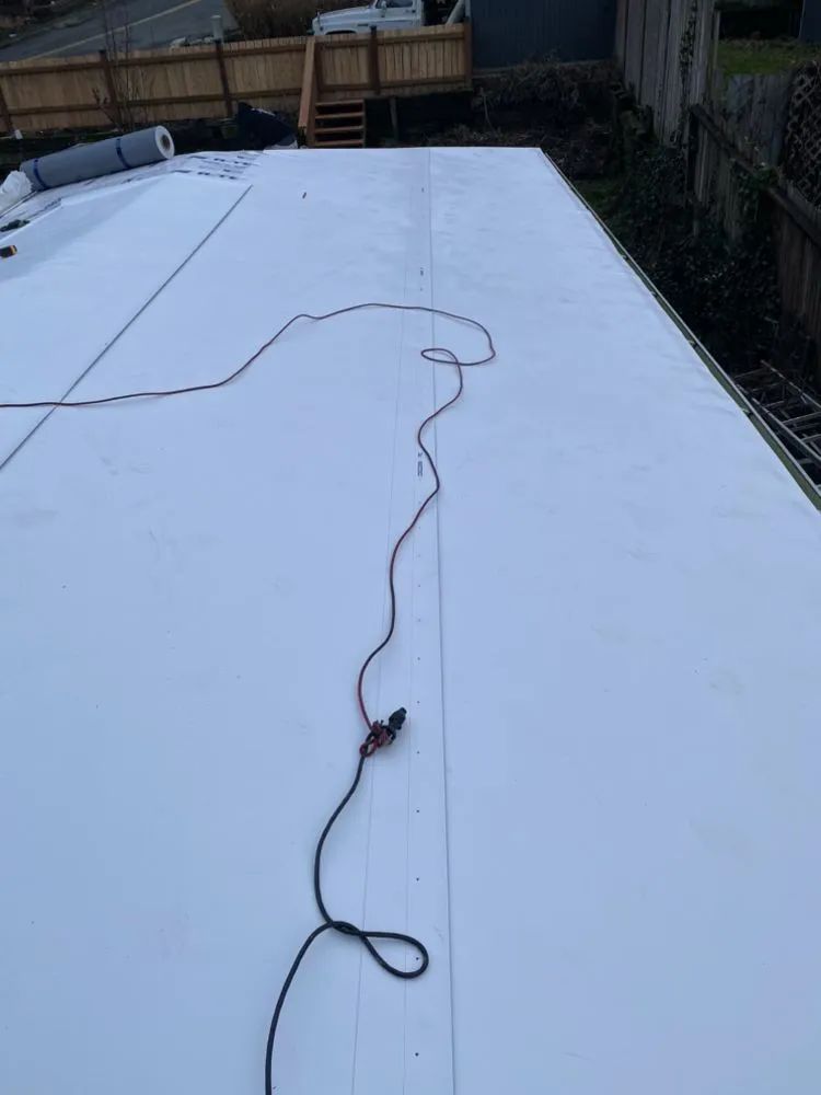 Slide of Valdez Roofing