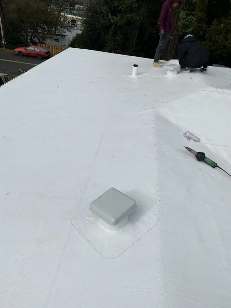 Slide of Valdez Roofing