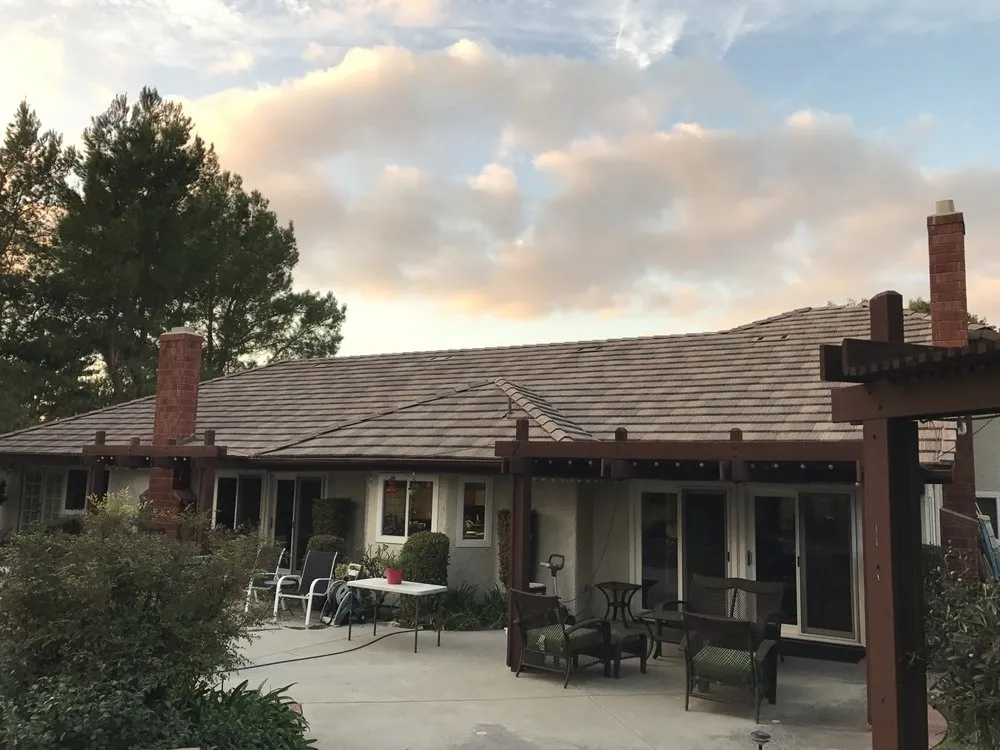 Slide of Valencia Roofing Company