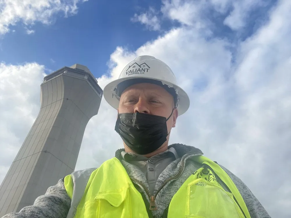 Slide of Valiant Roofing