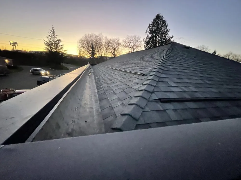 Slide of Valiant Roofing