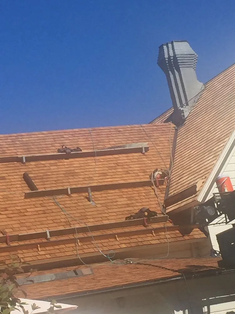 Slide of Valley Brothers Roofing