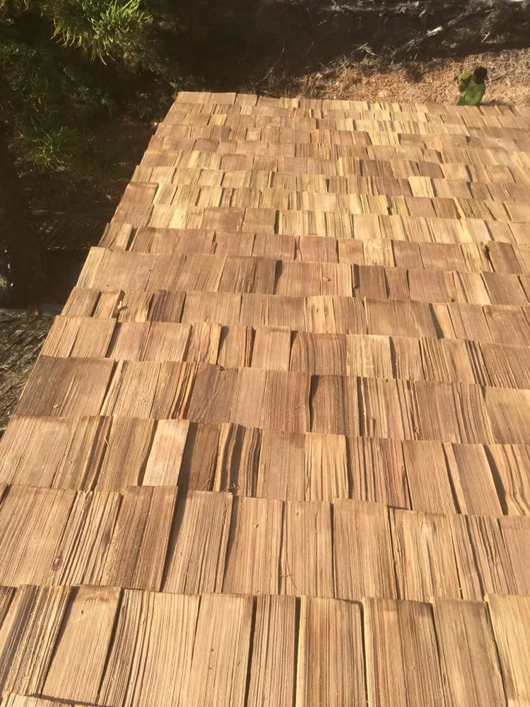 Slide of Valley Isle Roofing