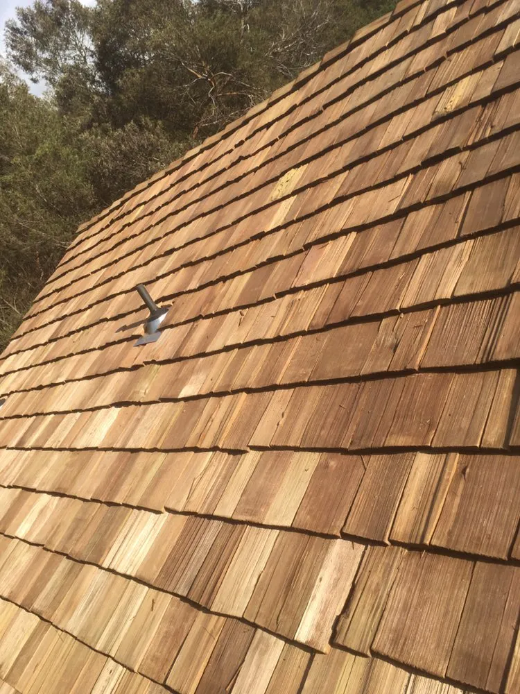 Slide of Valley Isle Roofing