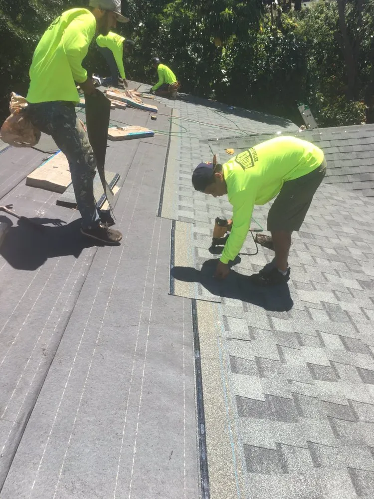 Slide of Valley Isle Roofing